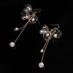 Clear triple flower drop earrings