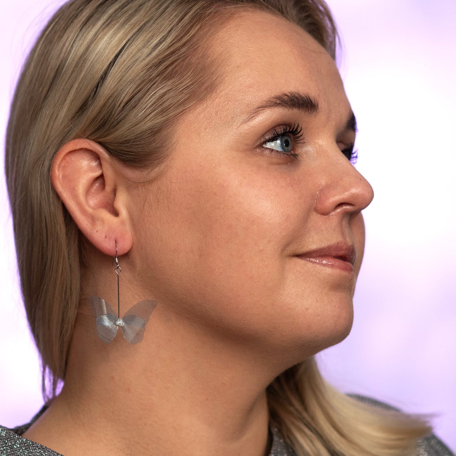 Blue butterfly drop earrings model