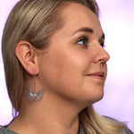 Blue butterfly drop earrings model